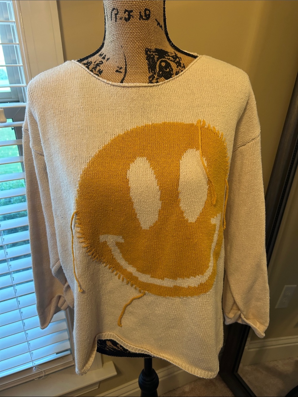 Cream Crewneck Sweater with Yellow Smiley Graphic